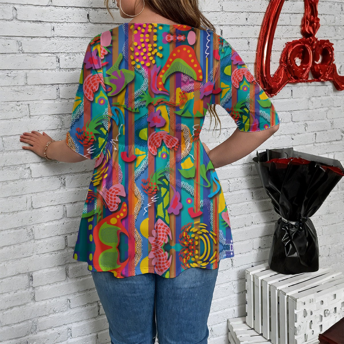 “Loud & Lovin it!”  Women's V-Neck Asymmetrical Hem Top